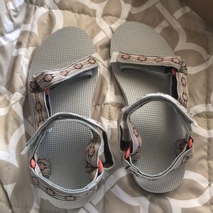 Brand new Tevas still in the box